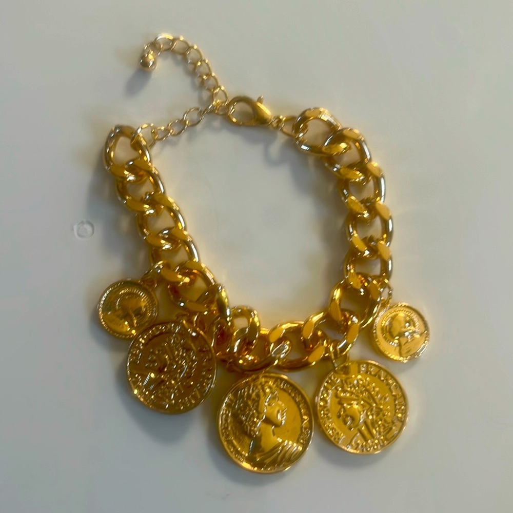 Money gold tone charm bracelet light weightt stainless stainless steel